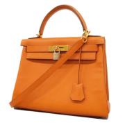 Pre-owned Leather handbags Hermès Vintage , Orange , Dames