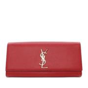 Pre-owned Leather clutches Yves Saint Laurent Vintage , Red , Dames