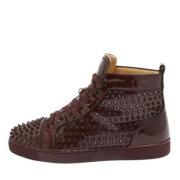 Pre-owned Leather sneakers Christian Louboutin Pre-owned , Red , Heren