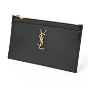 Pre-owned Leather clutches Yves Saint Laurent Vintage , Black , Dames