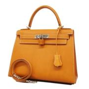 Pre-owned Leather handbags Hermès Vintage , Orange , Dames