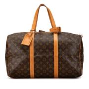 Pre-owned Canvas travel-bags Louis Vuitton Vintage , Brown , Dames