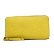 Pre-owned Fabric wallets Louis Vuitton Vintage , Yellow , Dames