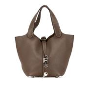 Pre-owned Leather handbags Hermès Vintage , Brown , Dames