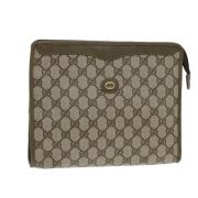 Pre-owned Leather clutches Gucci Vintage , Brown , Dames