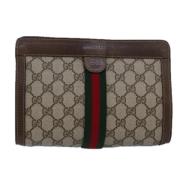 Pre-owned Leather clutches Gucci Vintage , Brown , Dames