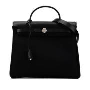 Pre-owned Leather handbags Hermès Vintage , Black , Dames