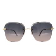 Pre-owned Metal sunglasses Cartier Vintage , Yellow , Dames