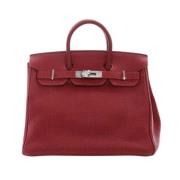 Pre-owned Leather handbags Hermès Vintage , Red , Dames