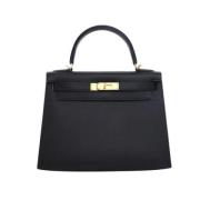 Pre-owned Leather handbags Hermès Vintage , Black , Dames