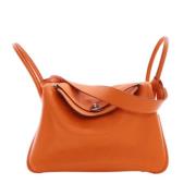 Pre-owned Leather handbags Hermès Vintage , Orange , Dames