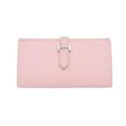 Pre-owned Leather wallets Hermès Vintage , Pink , Dames