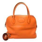 Pre-owned Leather handbags Hermès Vintage , Orange , Dames