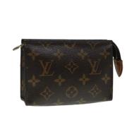 Pre-owned Canvas pouches Louis Vuitton Vintage , Brown , Dames