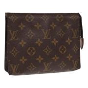 Pre-owned Canvas pouches Louis Vuitton Vintage , Brown , Dames