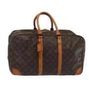 Pre-owned Canvas travel-bags Louis Vuitton Vintage , Brown , Dames