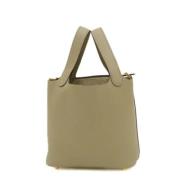 Pre-owned Leather handbags Hermès Vintage , Beige , Dames