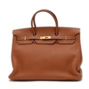 Pre-owned Leather handbags Hermès Vintage , Brown , Dames