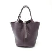 Pre-owned Leather handbags Hermès Vintage , Purple , Dames