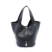 Pre-owned Leather handbags Hermès Vintage , Black , Dames