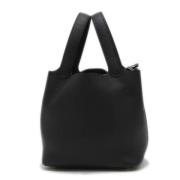 Pre-owned Leather handbags Hermès Vintage , Black , Dames