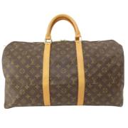 Pre-owned Canvas handbags Louis Vuitton Vintage , Brown , Dames