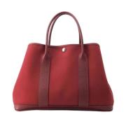 Pre-owned Leather handbags Hermès Vintage , Red , Dames