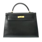 Pre-owned Leather handbags Hermès Vintage , Black , Dames