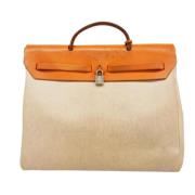 Pre-owned Canvas handbags Hermès Vintage , White , Dames