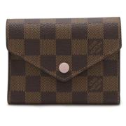 Pre-owned Fabric wallets Louis Vuitton Vintage , Brown , Dames