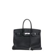 Pre-owned Leather handbags Hermès Vintage , Black , Dames