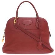 Pre-owned Leather handbags Hermès Vintage , Red , Dames