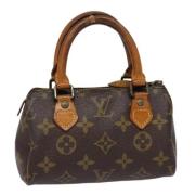 Pre-owned Canvas handbags Louis Vuitton Vintage , Brown , Dames