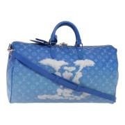 Pre-owned Canvas travel-bags Louis Vuitton Vintage , Blue , Dames