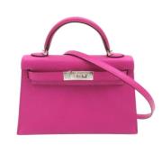 Pre-owned Leather handbags Hermès Vintage , Pink , Dames