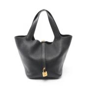 Pre-owned Leather handbags Hermès Vintage , Black , Dames