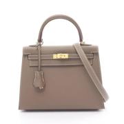 Pre-owned Leather handbags Hermès Vintage , Beige , Dames