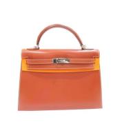 Pre-owned Leather handbags Hermès Vintage , Orange , Dames