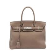 Pre-owned Leather handbags Hermès Vintage , Brown , Dames