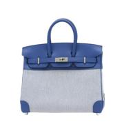 Pre-owned Canvas handbags Hermès Vintage , Blue , Dames