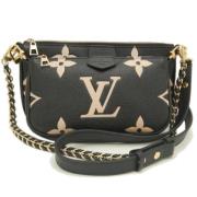 Pre-owned Leather clutches Louis Vuitton Vintage , Black , Dames