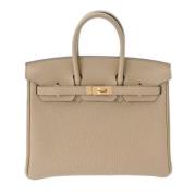 Pre-owned Leather handbags Hermès Vintage , Beige , Dames