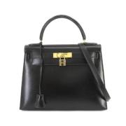 Pre-owned Leather handbags Hermès Vintage , Black , Dames