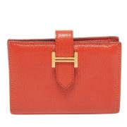 Pre-owned Leather wallets Hermès Vintage , Orange , Dames