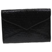 Pre-owned Leather clutches Yves Saint Laurent Vintage , Black , Dames