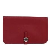 Pre-owned Leather clutches Hermès Vintage , Red , Dames