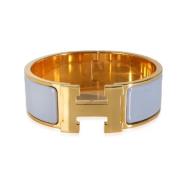 Pre-owned Metal bracelets Hermès Vintage , Yellow , Dames