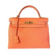 Pre-owned Leather handbags Hermès Vintage , Orange , Dames