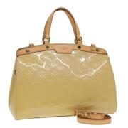 Pre-owned Leather handbags Louis Vuitton Vintage , Beige , Dames