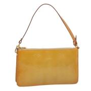 Pre-owned Leather clutches Louis Vuitton Vintage , Beige , Dames